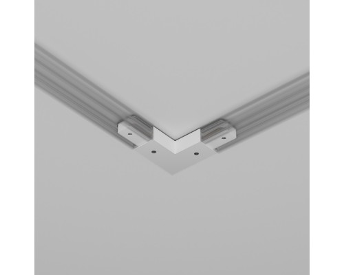 Коннектор угловой Accessories for tracks Unity TRA001CLB-11W Maytoni
